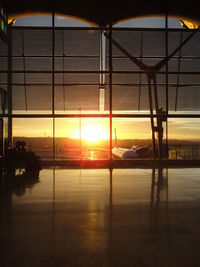 View of airport runway at sunset