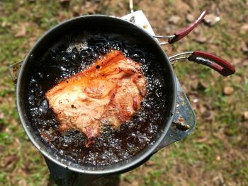 High angle view of meat on barbecue grill