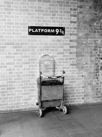 Information sign on brick wall