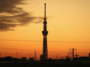 Communications tower at sunset