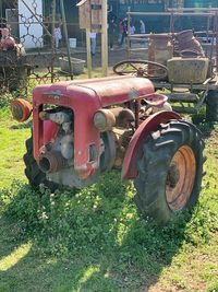 Abandoned tractor on field