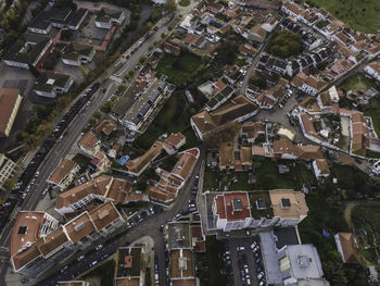 High angle view of street amidst buildings in town