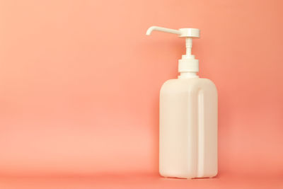 Close-up of bottle against white background