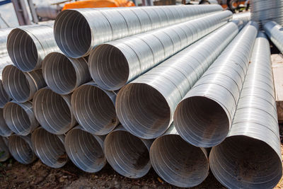 Ventilation pipe warehouse. steel pipes, parts for the construction of air ducts for an industrial