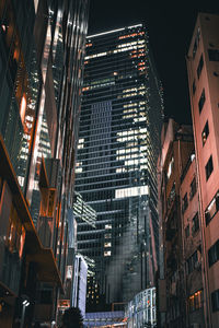 Buildings in city at night