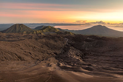 Scenic view of landscape against sky during sunset