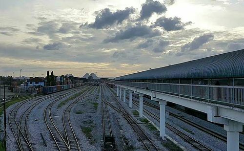 Panoramic view of railroad tracks against sky