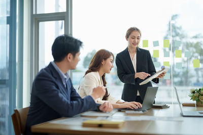 Business colleagues working at office