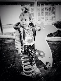 Little girl playing in playground