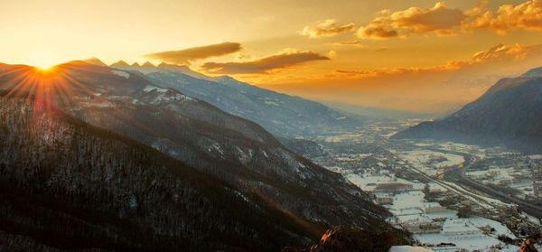 Scenic view of mountains against sky during sunset