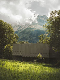 House on field against sky