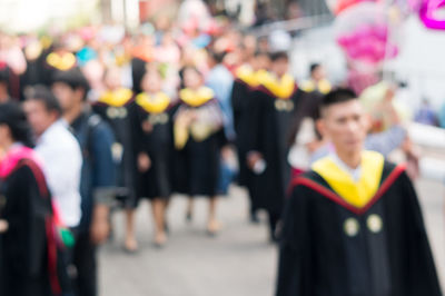 People standing on street in city