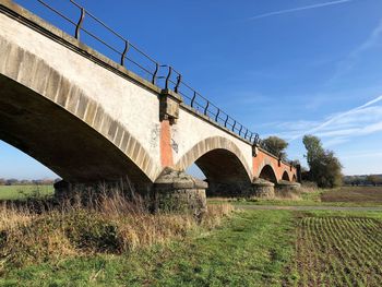 Low angle view of bridge against sky