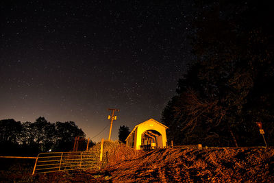 Low angle view of illuminated built structure