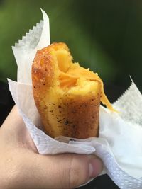 Close-up of hand holding ice cream