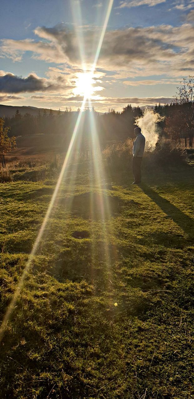 SCENIC VIEW OF LANDSCAPE AGAINST BRIGHT SUN