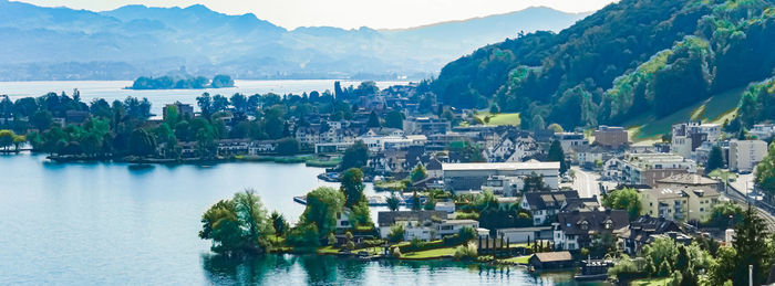 Panoramic view of sea and buildings in city