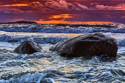 Panoramic view of sea against sky during sunset