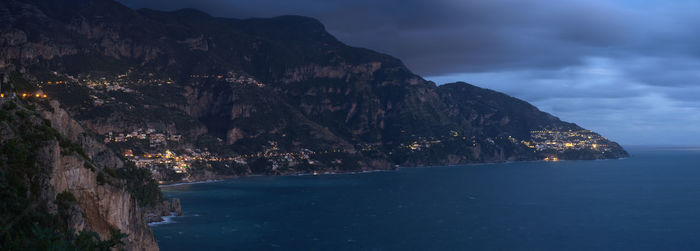 Scenic view of sea against sky at dusk