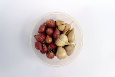 High angle view of strawberries in bowl on table