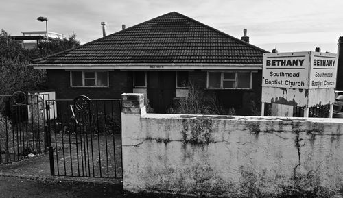 Exterior of house against buildings in city