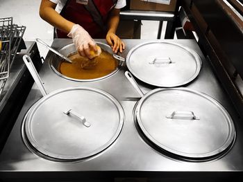 High angle view of man preparing food