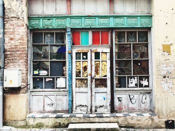 Graffiti on wall of old building