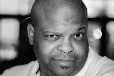 Close-up portrait of bald mature man