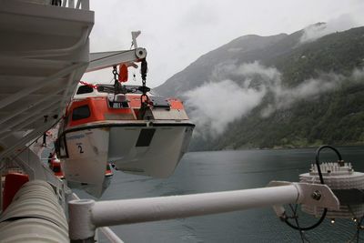 Nautical vessel on sea against sky