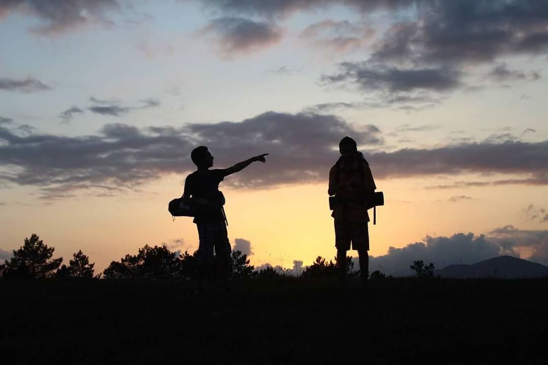 SILHOUETTE OF LANDSCAPE AT SUNSET