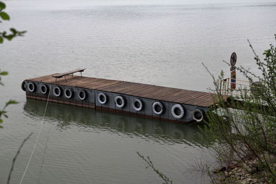 High angle view of text on boat in lake