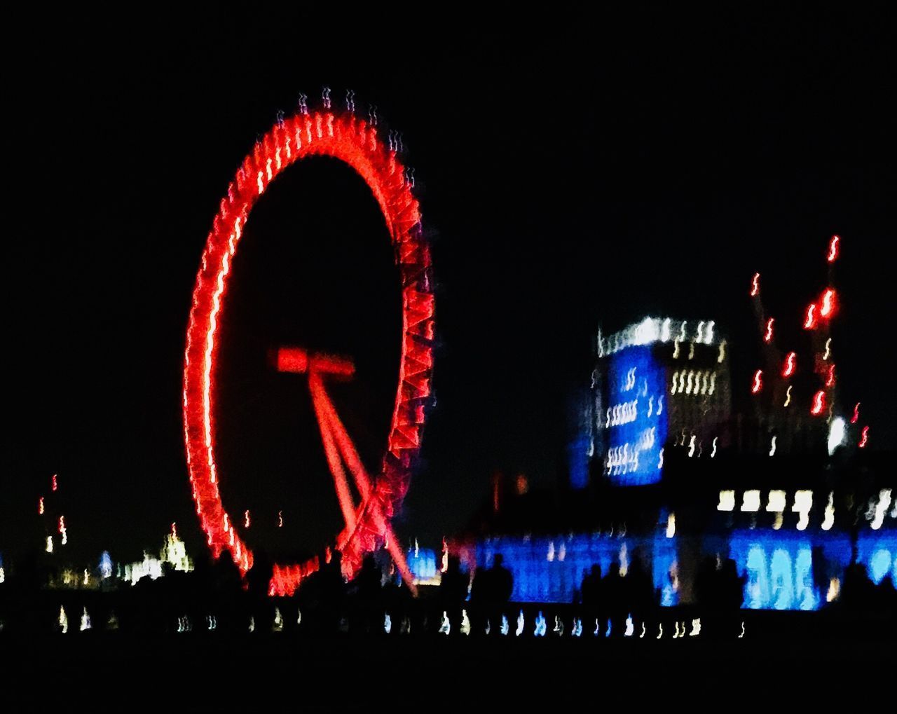 FIREWORK DISPLAY IN CITY AT NIGHT