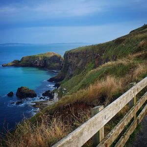 Scenic view of sea against cloudy sky