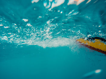 Close-up of water splashing in swimming pool