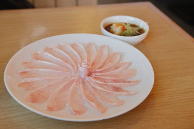 Close-up of fruit in plate on table