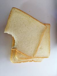 Close-up of bread against white background