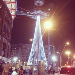 Low angle view of illuminated building at night