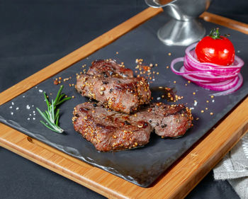 High angle view of meat in plate on table