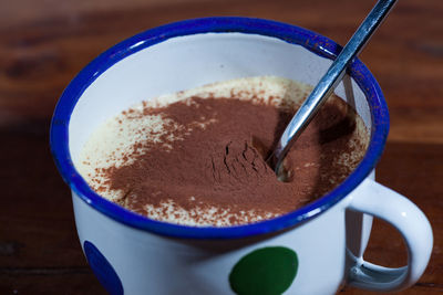 Close-up of cappuccino on table