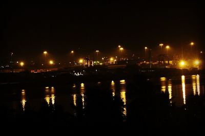 View of harbor at night