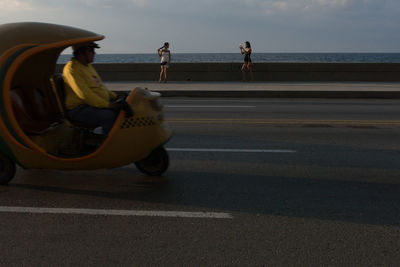 Man on sea against sky