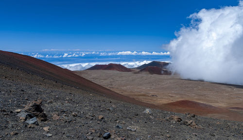 Scenic view of volcanic landscape against sky