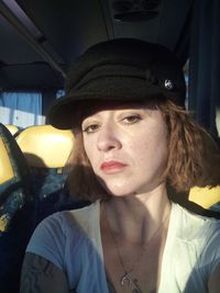 Portrait of beautiful woman in car