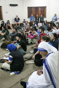 Group of people sitting in temple