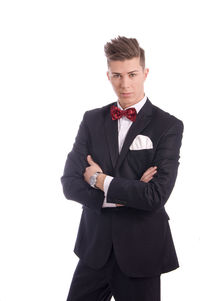 Portrait of a serious young man over white background