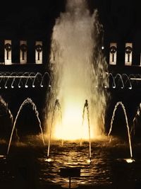 View of illuminated buildings at night