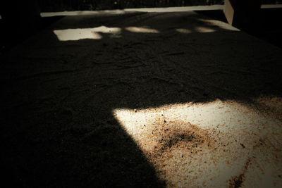 High angle view of shadow on road