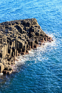 High angle view of castle by sea