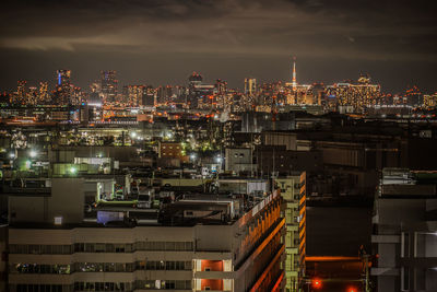 Illuminated buildings in city at night