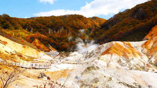 Scenic view of mountains against sky during autumn